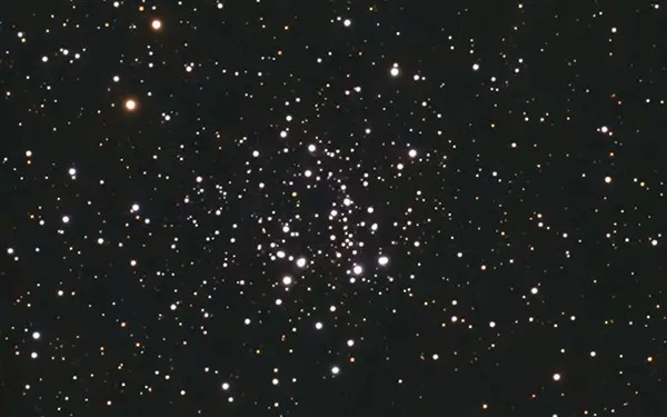 Shows a cluster of tight stars known as Caldwell 10