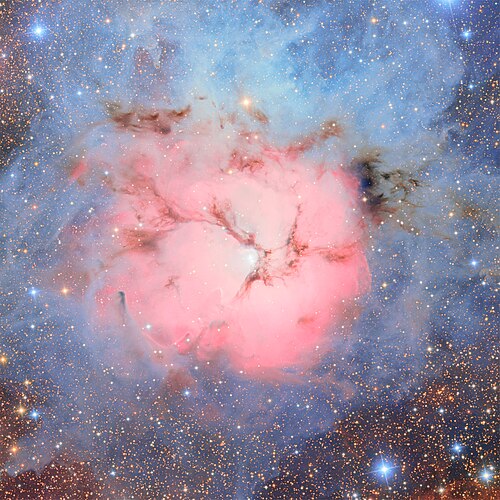 NASA photo of Trifid Nebula in Sagittarius showing its various colors.