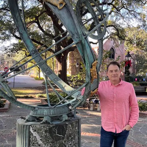 Wayne McGraw standing by the Troup Square Armillary Celestial Sphere.