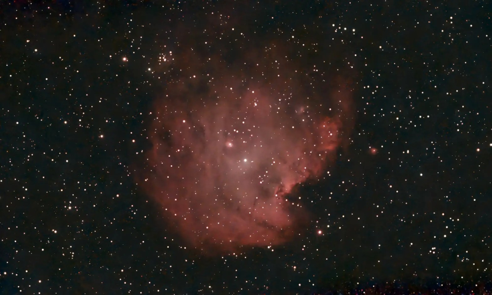 Red glow of Monkey Head Nebula