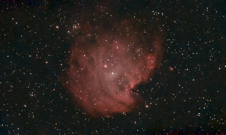 Red glow of Monkey Head Nebula