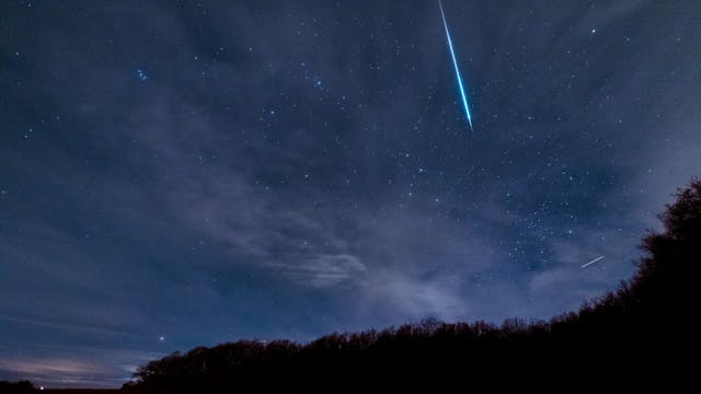 Meteor streaking across the sky.