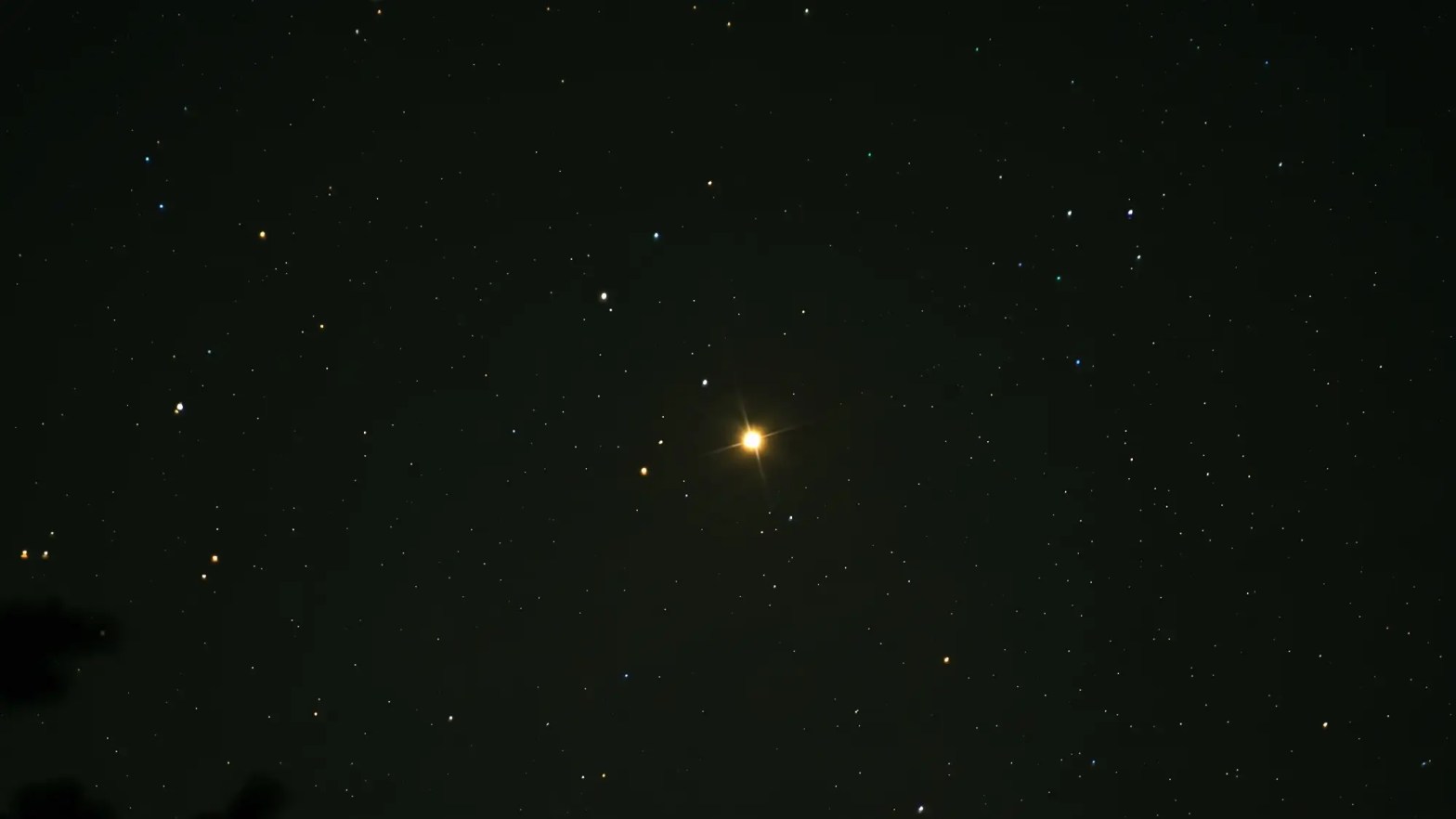 Photo of yellow star of Capella in constellation Auriga